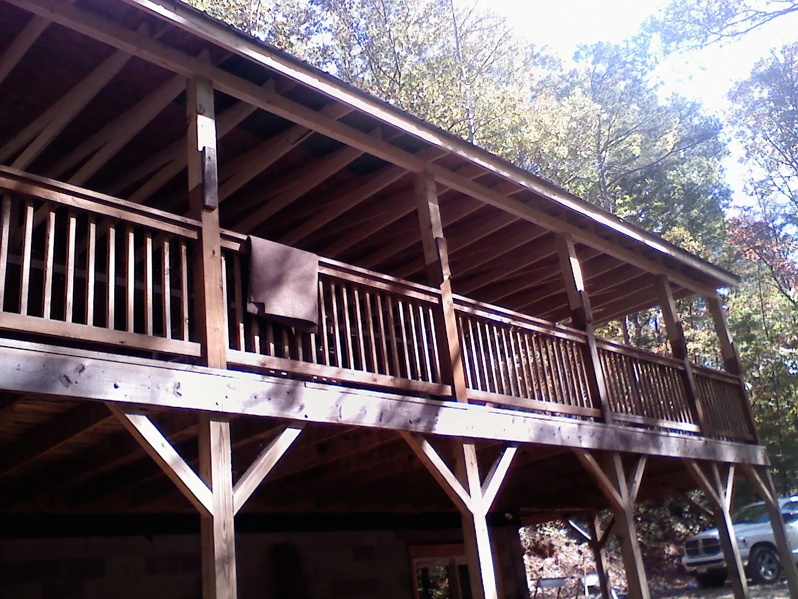Timber framing under a new elevated porch and deck — Roof Leak Repair in East Amherst by Roofing Brothers